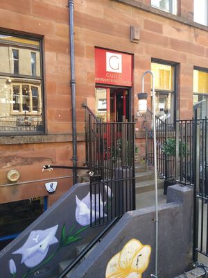 Guild Antiques & Restoration